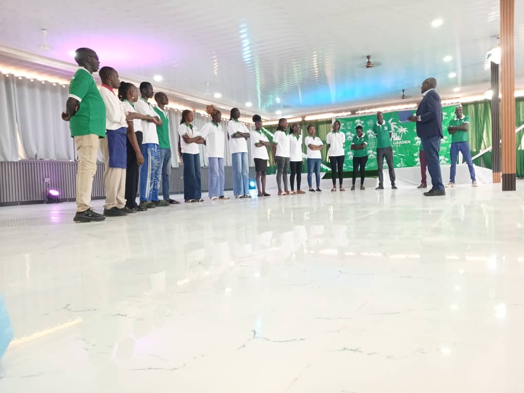 Castle Garden Center staff assembly on the polished marble floor of the main pavilion